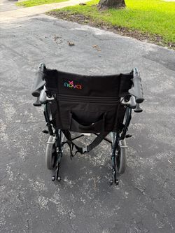 Nova Wheelchair with Push Handles