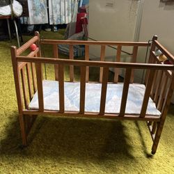 Vintage Doll Crib:  27” L x 15” W x 22” H 