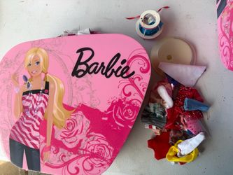 Vintage Barbie pink hard plastic storage & carrying case Floral W/ clothes   new Is new was used for display only. This Barbie plastic purse is a perf
