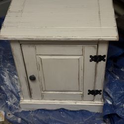 Small white wooden  cabinet 21” tall 19” wide 91/2”deep