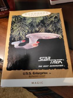 Christmas ornaments by hallmark star trek never been open.Perfect in box, old, twenty five dollars each