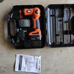 Black and Decker, 12 volt, cordless, swivel drill driver and battery.