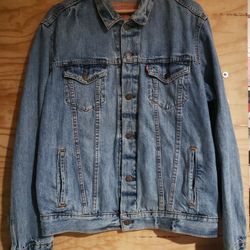 Vintage Levi's brand mid wash jean trucker jacket