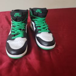 This is an Air Jordan 1 Retro High OG "Lucky Green"  

