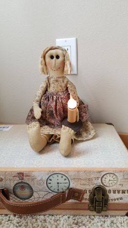 girl hold electric candle 15" long 9" sitting size new!