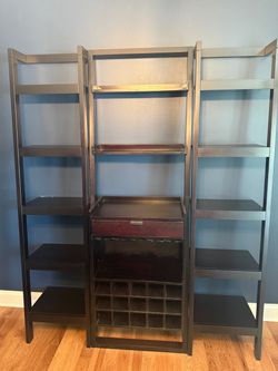 Crate and Barrel- Bar with shelves.