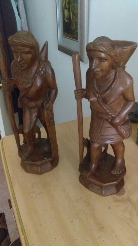 Two wooden men and woman
