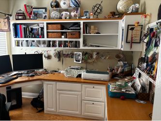 Built in desk with file cabinet and book shelf