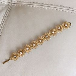 Filigree bracelet with faux pearls