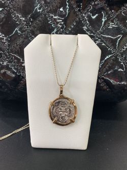 Beautiful Atocha coin pendant in gold bezel with silver chain