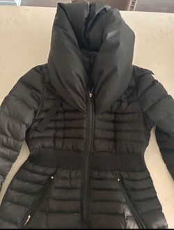 Women’s long fitted puffer jacket