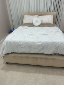 Upholstered queen bed frame