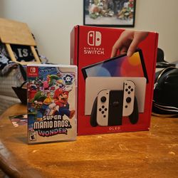 NINTENDO SWITCH OLED WITH MARIO WONDER