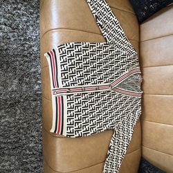 Size Medium-Large Woman’s Sweater $45 . Beige,Brown,and Red