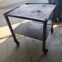 work table with drain in center of table