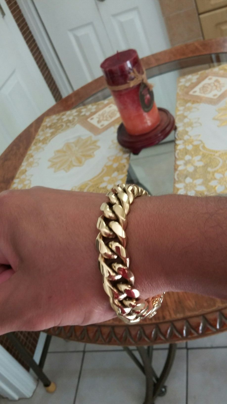 Very nice 14kt gold over stainless steel 12mm by 9inch long Miami Cuban link bracelet for sale !!