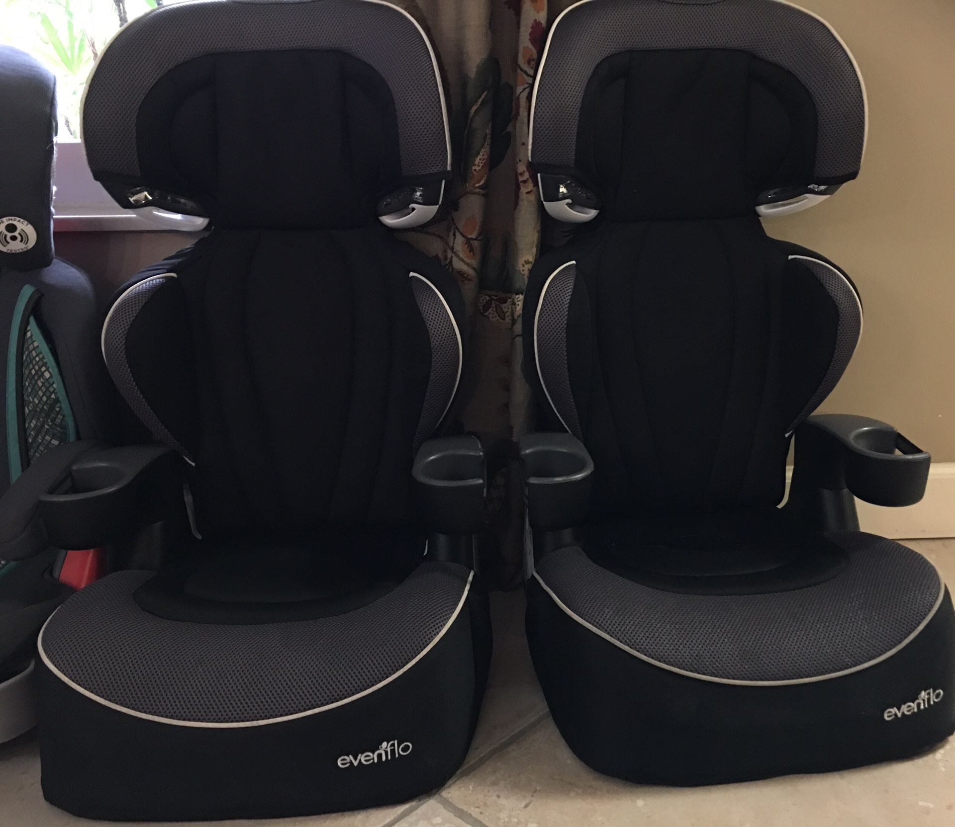 Evenflo booster seat with lights -- two matching
