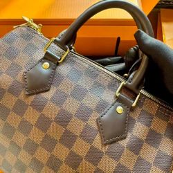 Louis Vuitton speedy brown checkered shoulder bag with crossbody strap