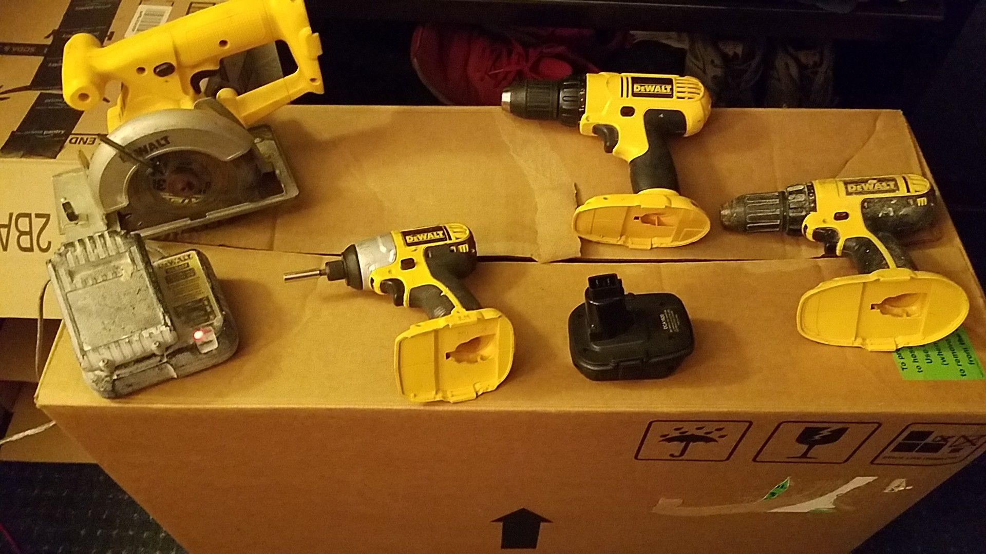 DEWALT 18v 4 tool set with 20v batterie and 18v adapter alone was 22$