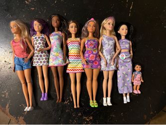Set of Barbie dolls with car