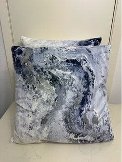 2 blue pillows
