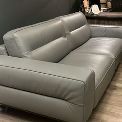 New  Natuzzi editions gray quality Leather Sofa.  Retails For 3,900