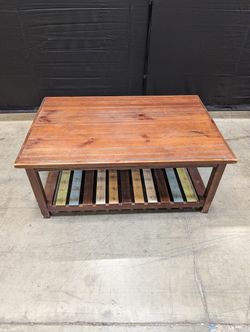 Rustic Wood Coffee Table with Multi-Color Slatted Shelf