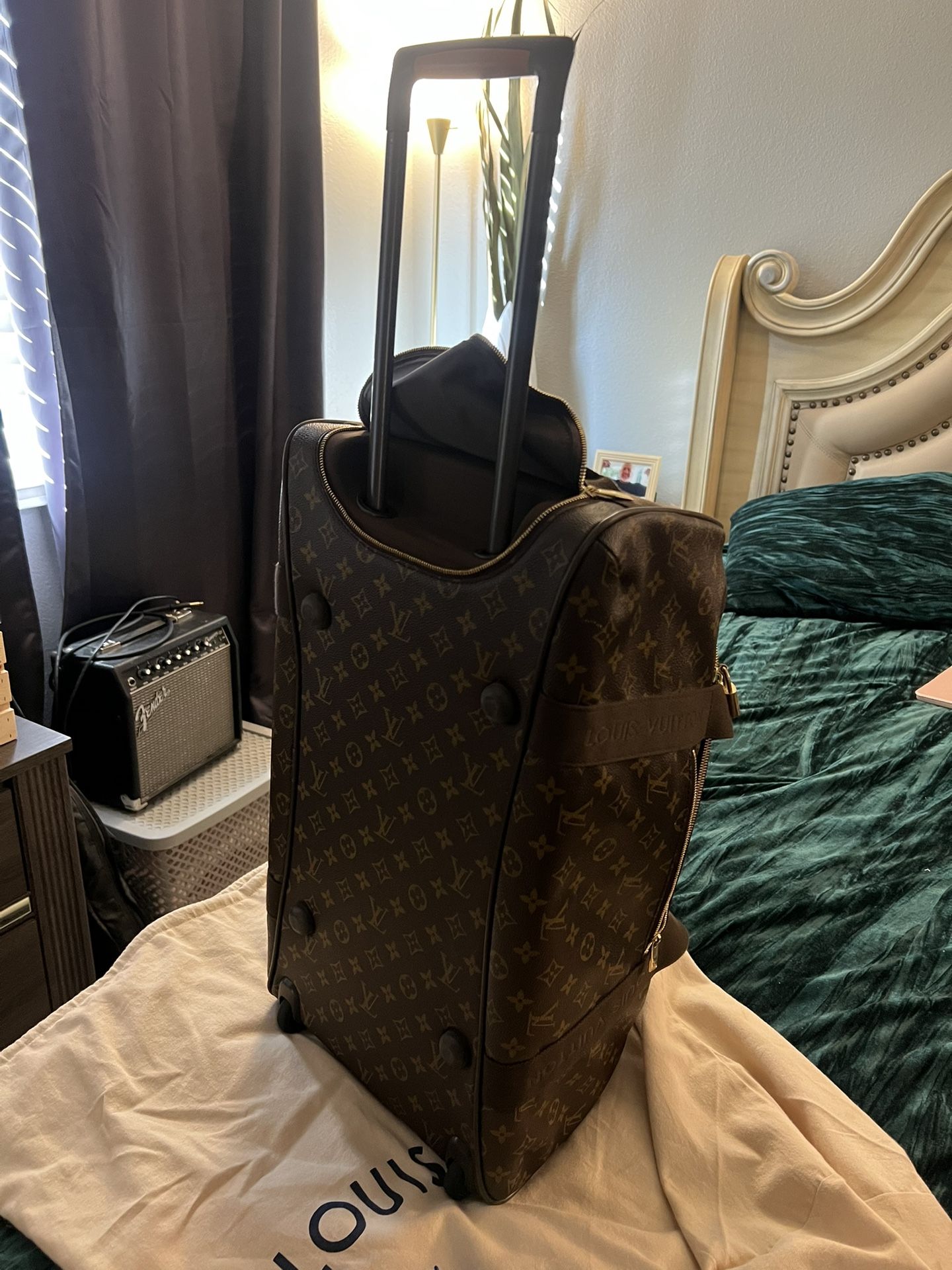 Louis Vuitton Rolling Duffle Luggage