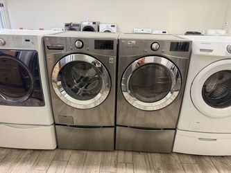 LG Stainless stainless steel frontload washer and dryer set electric with warranty
