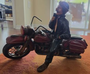 Resin vintage rider on Harley Davidson style motorcycle.