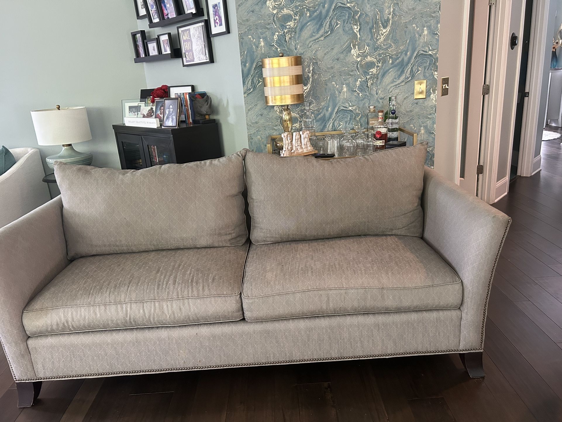 Gray Sofa w-nailhead trim.