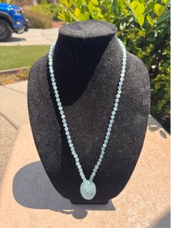 Aquamarine cabochon braded necklace