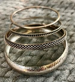 4 beautiful stack of textured metal bangle bracelets