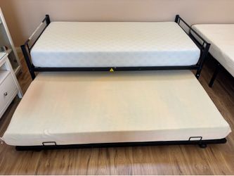 Trundle bed includes both mattresses