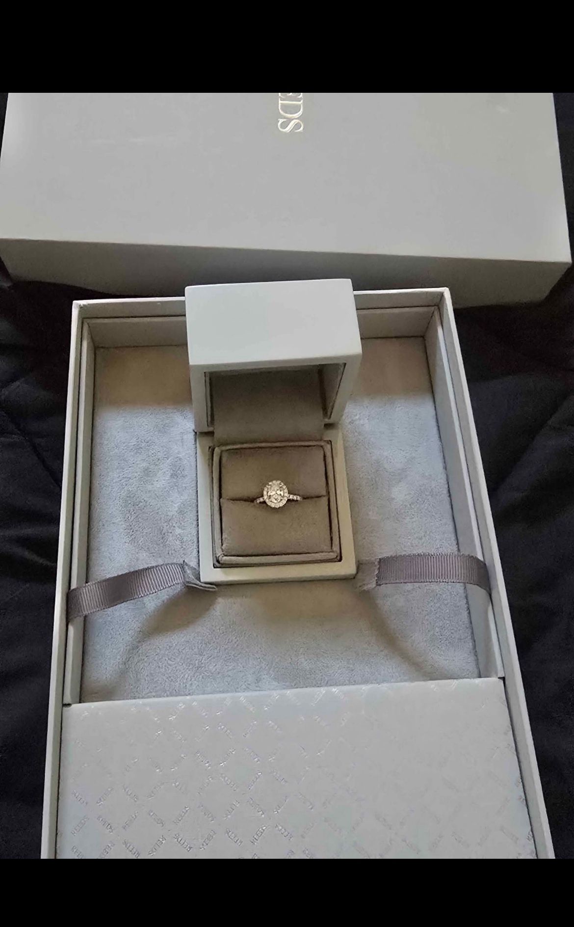 NEW 14 karat white gold ring