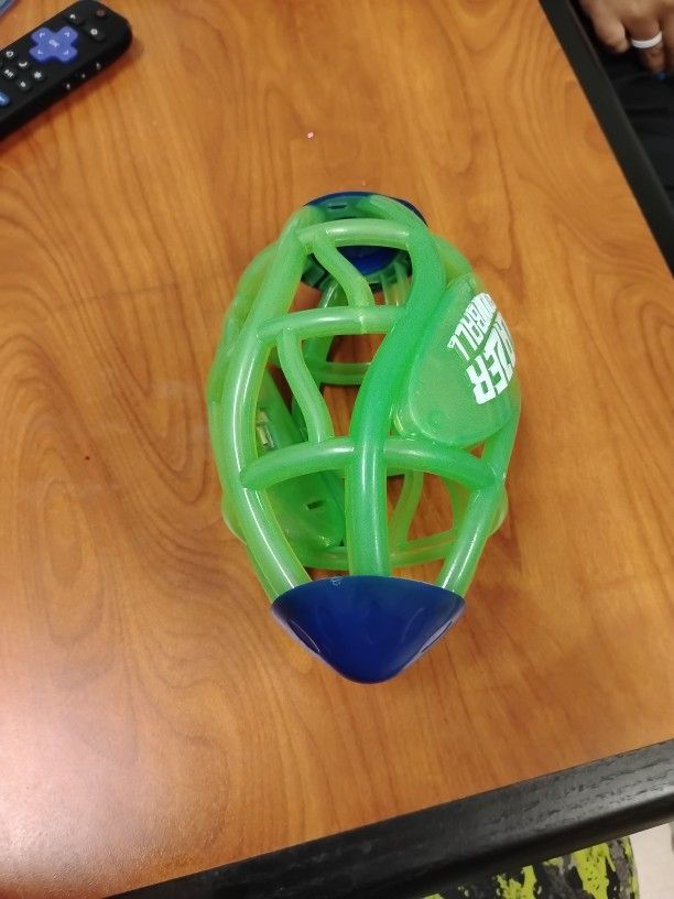 Lazer Football. Lights up no battery needed. (PUT MONEY IN A INVOLOPE)
