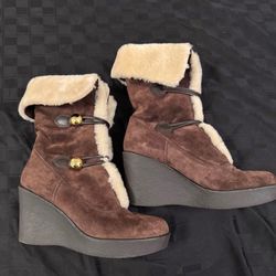 Coach wedge boots. Women size 7 Great condition. Only worn once.