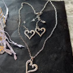  Hart Pendant And matching earrings are eight dollars each Set . Chain Is 16 Inches Long.