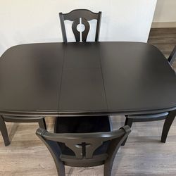 Black Dinning Room Table And Four Chairs