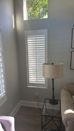 3 Faux wood shutters 21.875 x 57.625