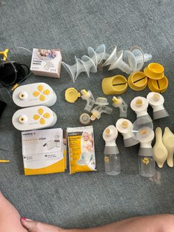 Two Medela Breast Pumps with jujube bags