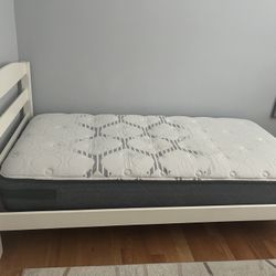 Uses wood bed frame with mattress in perfect condition.