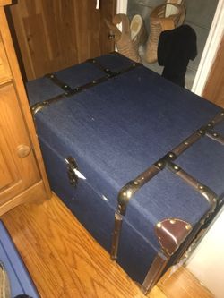 Jean and brass trunk