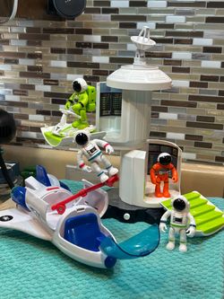 Space themed play sets with lights and sound. See photos of these cool toys.