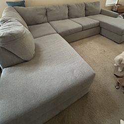 Medium Gray sectional couch with chaise on both sides 7ft