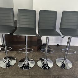 Brand New In Box / Set Of 4 Gray Bar Stools (executive) / Gray Pub Stools / Adjustable Height And Swivel / Price Is Firm / Pick Up Only 