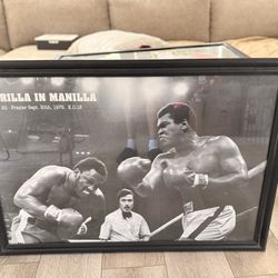 Muhammad Ali Poster in frame.