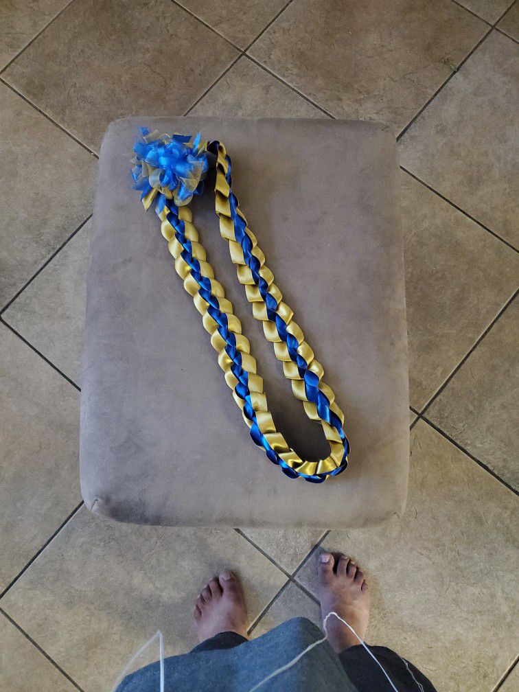 Blue And Gold Ribbon Lei. 