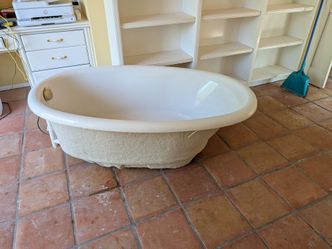 Free drop in tub and faucet