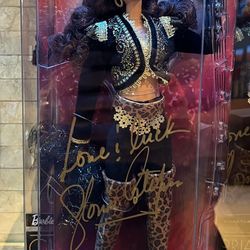 Gloria Estefan Autographed Barbie doll